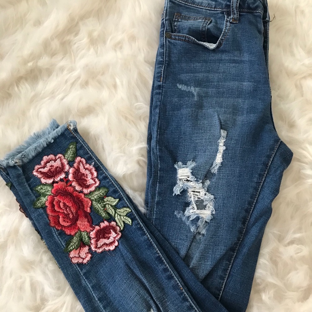 Embroidered rose distressed jeans